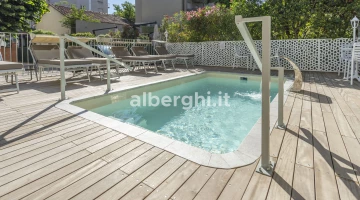 Small swimming pool with hydromassage and water blade.