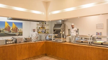 Kitchen with front cooking