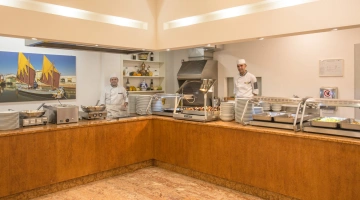 Kitchen with front cooking
