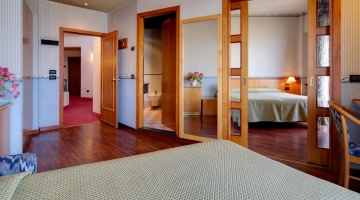 Junior suite con camera matrimoniale e zona giorno