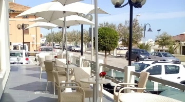 Terrace with tables and umbrellas