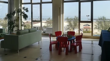 Common living area with children&#39;s games