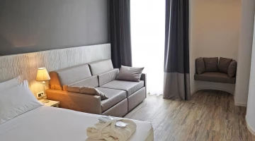 Junior suite with sofa and courtesy kit