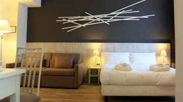 Junior suite con area salotto