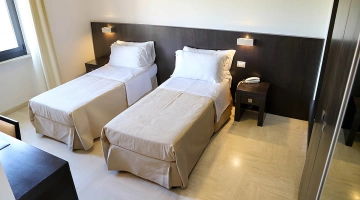 Chambre double standard avec lits simples