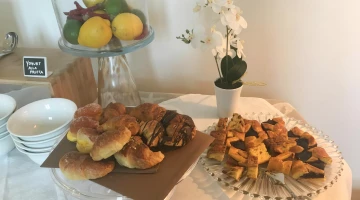 Breakfast with brioches and yogurt