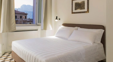Suite luminosa con divano letto