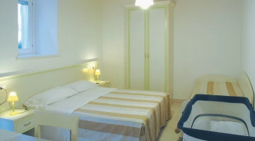 Chambre familiale avec lit bébé supplémentaire