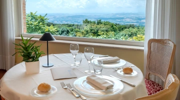 Table in the restaurant hall with a panoramic view