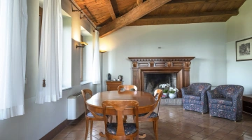 Living room in suite with fireplace