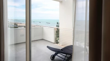 Room with furnished balcony