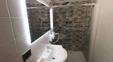 Private bathroom with shower