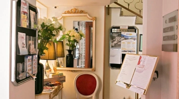 Small noticeboard with brochures