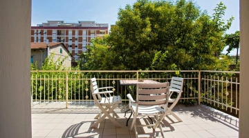 Private balcony with table and chairs
