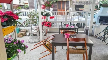 Furnished gazebo with barbecue