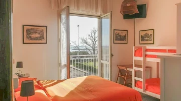 Quadruple room with private balcony