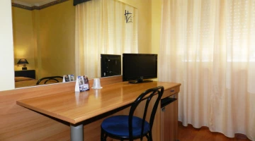 Desk and TV in the room