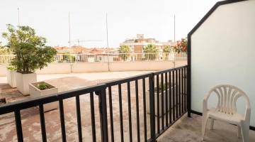 Room with furnished balcony