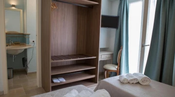 Exposed wardrobe in the room