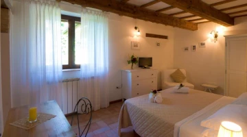 Chambre avec vue sur le jardin