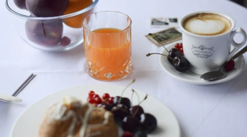 Juice and fresh fruit for breakfast
