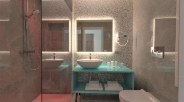 Bathroom with large shower cubicle with chromotherapy