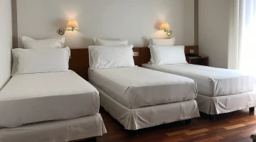 Suite mit Dreibettzimmer