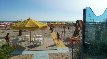 Private beach with relaxation area