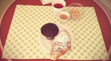 Muffins, croissants and fruit juice