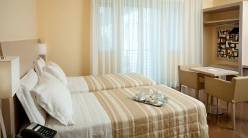 Chambre avec deux lits simples