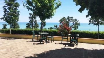 Outdoor spaces furnished with tables