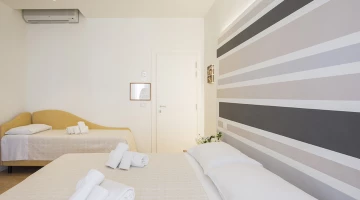 Dreibett-/Vierbettzimmer