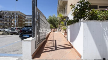 Entrance with ramp for disabled people