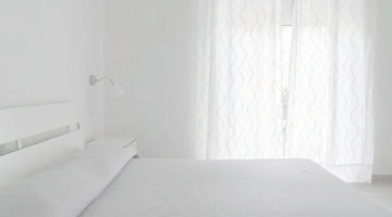 Camera matrimoniale con balcone privato