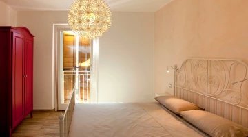 Double bedroom with wardrobe and balcony