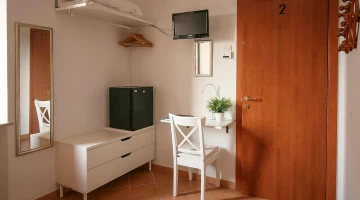 TV and mini-bar in the room