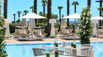 Tables and solarium by the pool