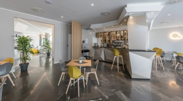 Bar with tables in common area