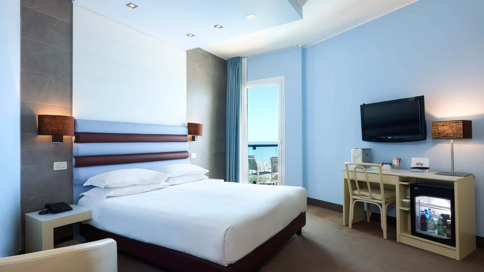 Chambre double de luxe avec TV et minibar