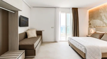 Suite Junior avec TV et canapé