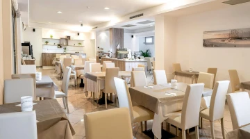 Tables set in the breakfast room