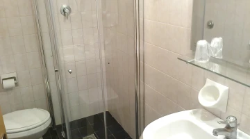 Private bathroom with shower cubicle