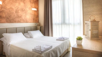Doppelzimmer mit Balkon im Familienzimmer