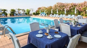 Tables set up for breakfast outside