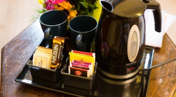 Kettle with selection of teas and herbal teas in the room