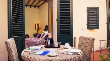 Patio con arredo da esterno