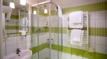 Bathroom with towels and shower