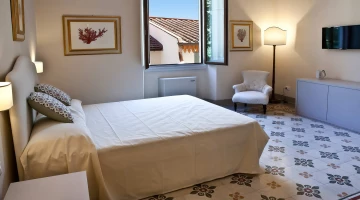 Letto matrimoniale della camera tripla verde