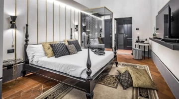 Suite Deluxe avec lit double et douche dans la chambre