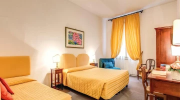 Chambre triple avec parquet